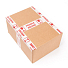 Obrázok Krabice zalepená lepicí páskou FRAGILE/křehké